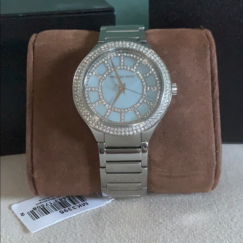 NEW NEVER WORN women’s Michael Kors watch.